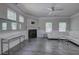 Living room with fireplace, large windows, and ample natural light at 158 Bryon Ln, Acworth, GA 30102