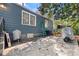 Backyard with a stone patio and blue siding on the house at 1649 Beecher Sw St, Atlanta, GA 30310