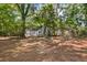 Backyard with a fire pit and a chain link fence at 1649 Beecher Sw St, Atlanta, GA 30310