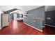 Bedroom with vaulted ceilings, hardwood floors, and a door to an outdoor deck at 1649 Beecher Sw St, Atlanta, GA 30310