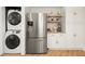 Bright kitchen features stainless steel appliances, granite countertops, and open shelving at 1649 Beecher Sw St, Atlanta, GA 30310