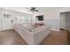 Spacious living room featuring a large sectional sofa, and natural light at 1649 Beecher Sw St, Atlanta, GA 30310