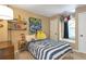 Bright bedroom featuring a bed, a window, and decor for a fun space at 1867 N Creek Cir, Alpharetta, GA 30009