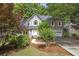 Charming two-story home with a well-manicured lawn and a cozy, inviting curb appeal at 1867 N Creek Cir, Alpharetta, GA 30009