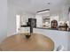 Open concept kitchen with breakfast nook, stainless appliances, and floating shelves at 1867 N Creek Cir, Alpharetta, GA 30009