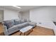 Cozy living room with plush seating, light hardwood floors, and modern decor at 1867 N Creek Cir, Alpharetta, GA 30009