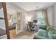 Well-lit office space featuring modern furnishings, a comfortable couch, and neutral paint at 1867 N Creek Cir, Alpharetta, GA 30009
