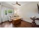 Inviting sitting room with hardwood floors, a cozy couch, and a stylish wooden chest at 281 15Th Ne St # 202, Atlanta, GA 30309