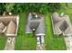 Bird's-eye view of a single-Gathering home with a spacious backyard surrounded by lush greenery at 1394 Isleworth Cir, Atlanta, GA 30349