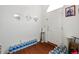 The entryway features a white door, wood floors and decorative mirrors at 1394 Isleworth Cir, Atlanta, GA 30349