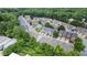 Overhead shot displaying the neighborhood's layout, landscaping, and the variety of architectural styles at 147 Townview Dr, Woodstock, GA 30189