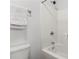 Bright bathroom with a shower/tub combo and white fixtures at 147 Townview Dr, Woodstock, GA 30189