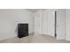 Bedroom features a closet and a chest of drawers at 147 Townview Dr, Woodstock, GA 30189
