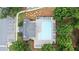 Aerial view of the community pool with lounge chairs, landscaping and parking at 147 Townview Dr, Woodstock, GA 30189