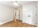 Spacious bedroom with hardwood floors, ceiling fan, and large closet at 1927 Alexander Se St, Smyrna, GA 30080