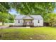 Charming home with a covered front porch and well-maintained lawn at 1927 Alexander Se St, Smyrna, GA 30080