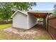 View of a garage with attached lean-to, offering covered storage or parking at 1927 Alexander Se St, Smyrna, GA 30080