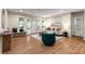 Inviting living area featuring hardwood floors, natural light, and stylish furniture, with access to the backyard at 1927 Alexander Se St, Smyrna, GA 30080