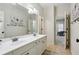 Bright bathroom features double sinks, a large mirror, and tasteful decor creating a functional space at 3250 Seven Oaks Dr, Cumming, GA 30041