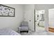 Bright bedroom with closet and adjacent bathroom featuring clean lines and modern fixtures at 3250 Seven Oaks Dr, Cumming, GA 30041