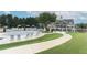 Resort-style pool area featuring lounging chairs, shaded seating, and a winding waterslide at 3250 Seven Oaks Dr, Cumming, GA 30041