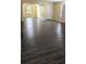 Spacious bonus room with hardwood flooring, neutral walls, and great natural light at 4160 Post Oak Grv, Atlanta, GA 30349