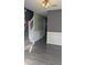 Bright entryway featuring hardwood floors, classic wainscoting, and a staircase at 4160 Post Oak Grv, Atlanta, GA 30349