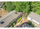 An aerial view of a beautiful home surrounded by lush green trees at 5400 Roswell Rd # Apt E6, Sandy Springs, GA 30342