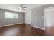 Bedroom with hardwood floors, ceiling fan, and a closet with a door at 5400 Roswell Rd # Apt E6, Sandy Springs, GA 30342