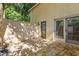 Private backyard patio with stone pavers surrounded by brick wall at 5400 Roswell Rd # Apt E6, Sandy Springs, GA 30342