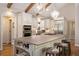 Spacious kitchen with stainless steel appliances and large island with seating at 7265 Hunters Branch Dr, Sandy Springs, GA 30328