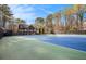 Well-maintained tennis courts in a serene, wooded setting, perfect for recreational sports at 7265 Hunters Branch Dr, Sandy Springs, GA 30328