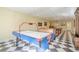 Game room with an air hockey table, foosball table, and pool table with checkerboard flooring at 1765 Dew Pl, Marietta, GA 30064
