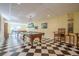 Basement game room with pool table, foosball, and vintage style chairs at 1765 Dew Pl, Marietta, GA 30064