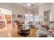 Spacious living room featuring a large sectional sofa, hardwood floors, and high ceilings at 1765 Dew Pl, Marietta, GA 30064