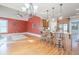Open-concept living room with a large island and bright lighting fixtures at 1765 Dew Pl, Marietta, GA 30064