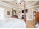 Beautiful primary bedroom showcasing a trey ceiling and hardwood floors at 1765 Dew Pl, Marietta, GA 30064