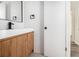 Bathroom featuring a sleek, modern vanity with a black faucet and framed mirror at 3232 Abbeywood Dr, Decatur, GA 30034