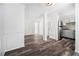 Open concept living space, with stainless steel refrigerator and eat-in kitchen at 3232 Abbeywood Dr, Decatur, GA 30034