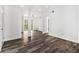 Spacious living room with modern floors, fresh white paint, and lots of natural light at 3232 Abbeywood Dr, Decatur, GA 30034