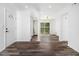 Bright living room with modern floors, fresh white paint, and large sliding glass doors at 3232 Abbeywood Dr, Decatur, GA 30034
