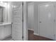 Bathroom features a white vanity with storage, and a linen closet in view at 113 Canal St, Hampton, GA 30228