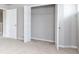 Spacious bedroom closet with bi-fold doors and wire shelving at 113 Canal St, Hampton, GA 30228