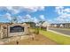 Stone entrance sign for The Gates at Pates Creek, a beautiful, modern planned community at 113 Canal St, Hampton, GA 30228