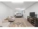 Finished basement bedroom with neutral tones, carpet, and furniture provides a comfortable and relaxing space at 2109 Allgood Rd, Marietta, GA 30062