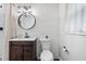 Modern bathroom features shiplap walls, a dark wood vanity, and subway tile shower at 2109 Allgood Rd, Marietta, GA 30062