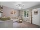Charming bedroom features a crib, changing table, and a window with decorative curtains at 2109 Allgood Rd, Marietta, GA 30062