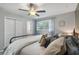 Inviting bedroom with a large window, closet, and neutral tones for a serene atmosphere at 2109 Allgood Rd, Marietta, GA 30062