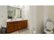 Bathroom features double sink vanity, toilet, and tile flooring at 2833 Golden Club Bnd, Austell, GA 30106
