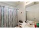 Bathroom features sink, toilet, shower, and neutral decor at 2833 Golden Club Bnd, Austell, GA 30106